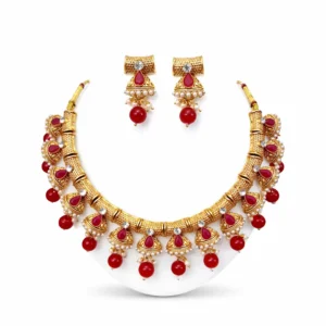 Gold plated kundan necklace set for women with red stones and pearls traditional bridal jewellery white background