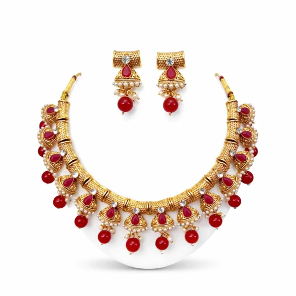 Gold plated kundan necklace set for women with red stones and pearls traditional bridal jewellery white background
